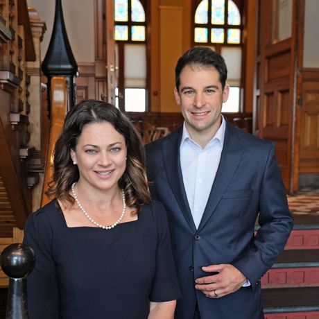 Donors Amanda and John Sacks on the steps at the West Bend Court House