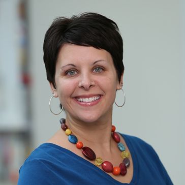 headshot of Amy James